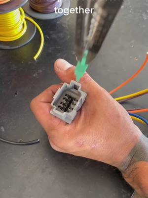 A post by @5x114sucks on TikTok caption: How to put connectors together 🤙 #wiring #racecar #drift #tedious #electrical #asmr #handmade #craftsman #ftp