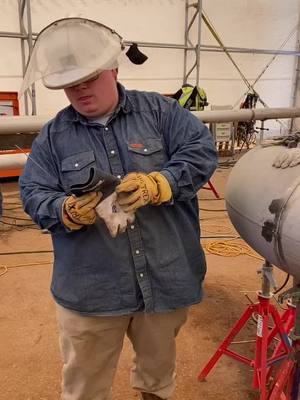 A post by @burnrods93 on TikTok caption: When you get on that big boy stainless.  Grade A fitter right here. #weldlife #stainless #pipewelder #ironworker #fyp #foryou @bigtrexxx