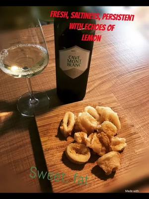 A post by @daniele.adorno on TikTok caption: Perfect pairing with Blanc de Morgex et de la Salle with fried squids. #wine #italianlifestyle #italianlife #food #italia #vino #cibo #viaggi