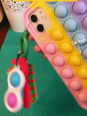 A post by @bubbletoyforever on TikTok caption: DIY phone charm with fidgets 😍#fyp #fidgets #fidgettoys #fidgetsoftiktok #popit #fidgetfun #viral #blowup