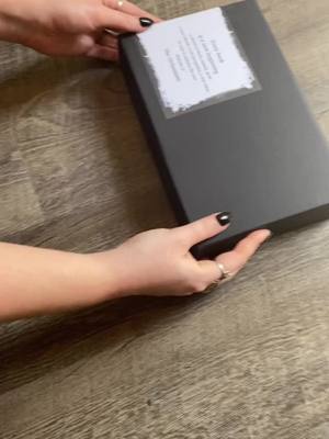 A post by @krissyleblanc on TikTok caption: When the book packaging is so pretty you make your husband video it. #BookTok #theoctunnumi #fyp #foryou