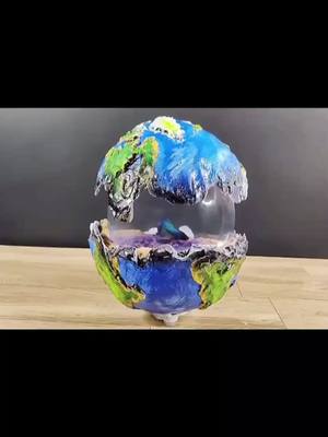 A post by @victoriajulian8 on TikTok caption: Made a globe out of the leftover material from the renovation.The moral is that no matter where you are, we are all in one home.#Originality#Handwork