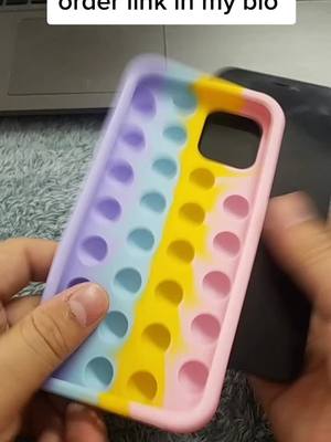 A post by @popitphonecase on TikTok caption: order one protect your phone #fidgettoy #popit #fidgettoys #phonecase #popitcase