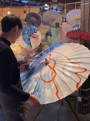 A post by @rxdwy on TikTok caption: Oil paper umbrella China's intangible cultural heritage#SkipTheRinse #bioamall #icecream #molds #TikTokGGT #clean #delicious