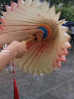 A post by @rxdwy on TikTok caption: Oil paper umbrella China's cultural heritage#ShadowAndBone #bioamall