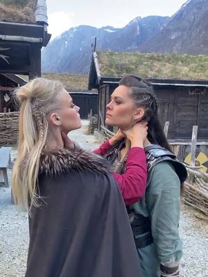 A post by @alexandraehernandez on TikTok caption: When you’re angry but still care for her ❤️⚔️😂 @kickass_karianne @thebeardstruggle #viking#vilings#shieldmaiden#shieldmaidens#norway#valkyrie#fight