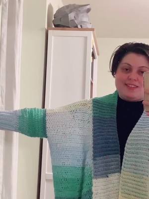 A post by @xeronin on TikTok caption: Made a cardigan and fought some demons, how are you guys doing? #crochet #cardigan #art