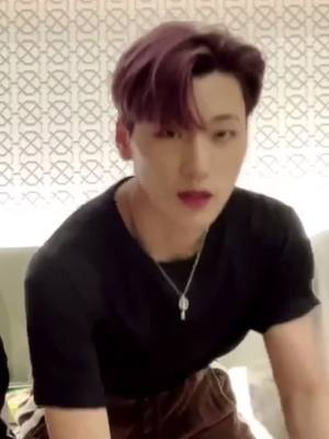 A post by @ateezdesire on TikTok caption: the black shirt the eyebrow slit the dangling chain the wink the san #ateez #atiny #san #ateezsan #choisan #fyp