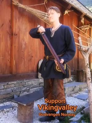 A post by @vikingvalley on TikTok caption: Anders the blacksmith of Njardarheimr, displays his latest sword