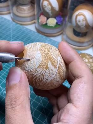 A post by @quchun_123 on TikTok caption: #sculpture #egg #creativit #handmade #eggshell #tiktok