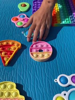 A post by @fidget.legend on TikTok caption: Fidget Trading In The Pool With My Cousins @legit_fidget_trades @fidget.trades.girl Link In Bio To Get These Fidgets🥳😇