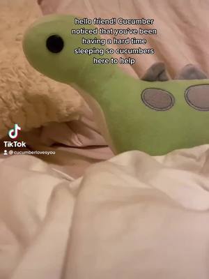 A post by @cucumberlovesyou on TikTok caption: 🥒❤️Cucumber helps his friend go to sleep!❤️🥒 #sleep #rest #cucumberlovesyou #fyp #foryou #goodnight #ukulele #israelkamakawiwoʻole #friend #cuketok