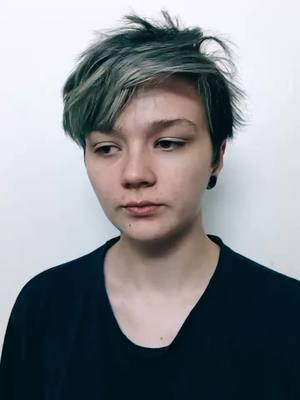 A post by @donthitreset on TikTok caption: why does unnatural colored facial hair give me gender euphoria? #trans #transition #ftm #afab #SelfCare #makeup #makeupisforeveryone