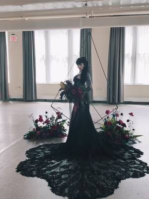 A post by @pennysebevrazda on TikTok caption: 🖤 behind the scenes gothic bridal shoot 🥀📸 @studiotwelve52 #goth #gothic #gothgirl #gothfashion #gothprincess #gothwedding #gothbride #inked