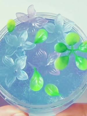 A post by @mochamroun on TikTok caption: 💙💜🌱🌱#slime #satisfyingvideo #fy #fürdich #slimes #fypシ #viral #miria_sh0