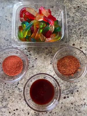 A post by @apples.more on TikTok caption: Gummy worms with chamoy 🐛🔥 #gummyworms #fypシ #chamoy #gomitas #gomitasenchiladas #foryou #parati #paratii #foryoupage #DADMOVES