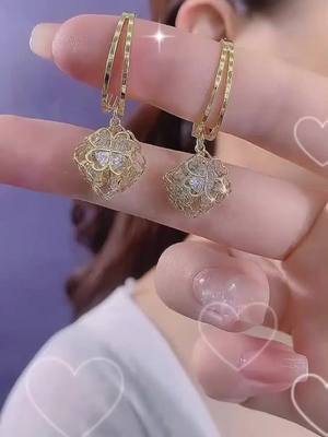 A post by @good.item.introduction on TikTok caption: Funny ear pendant#Jewelry Gifts #Jewelry Control #Net Red Jewelry #Couple Wear #High-end Jewelry #Customization #Colored Gemstone