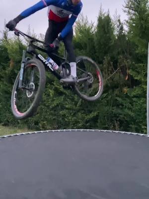 A post by @mathisazzaro on TikTok caption: Jumping the trampoline 🤪 #whip #whipitwednesday #mtb #mtblife #jump #jumping #jumpingonatrampoline #trampoline #fastlife #TeamOakley #pourtoi #foryou