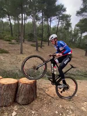 A post by @mathisazzaro on TikTok caption: Smooth in the woods 🚀 #mtb #mtblife #jump #jumping #woods #pourtoi #foryou