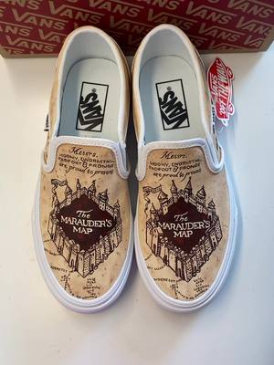 A post by @lympiaaa on TikTok caption: Custom shoes are now available at the link in my bio! #paintedvans #harrypotter #vans #paint #customshoes