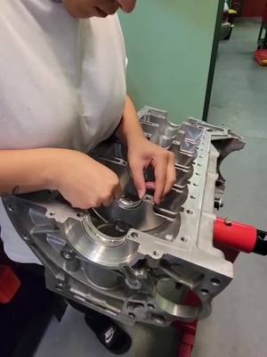 A post by @izzystax6 on TikTok caption: #n55 #bmwbuild #builtnotbought #carcommunity #engine #built #cargirl #izzydidit #carworld #800whp #kingbearings #doneright #performancebuild