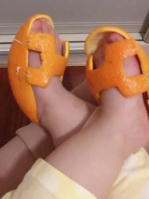 A post by @jingying723 on TikTok caption: Made a pair of orange shoes for her daughter,cute not?#foryou #GetGrafting #DIY #fyp #handmade #foryoupage