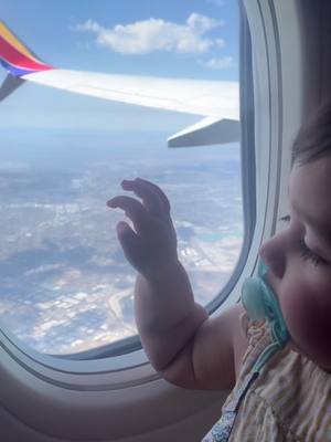 A post by @bigsister_life on TikTok caption: Evangelia’s first time on a plane and day 1 of our trip!! ✈️🤍 #fyp #airplane #baby #evangelia #trip