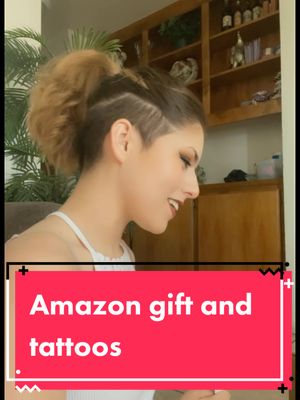 A post by @yukese_art on TikTok caption: Amazon package and showing off my tattoos :3 Thank you so much AJ!