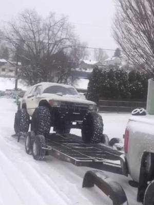 A post by @toyotacrawler on TikTok caption: I miss the snow. Wanna go for a ride? #idaho #snow #snowwheeler #usa #toyota #4runner #42s #trump #nodemocratsaloud