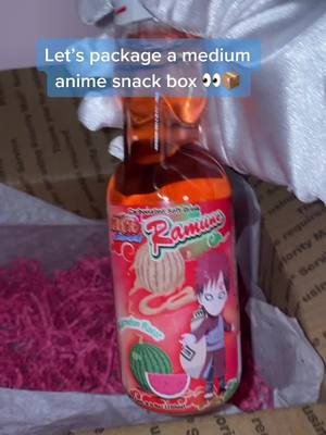 A post by @user243157932 on TikTok caption: Let’s package a medium anime snack box 💕👀 #animetheme #snackbox #japanesesnacks #SmallBusiness