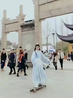 A post by @123hanfu on TikTok caption: The skateboard is beautiful.  #cool #China #kungfu #scooter