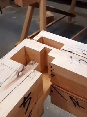 A post by @designedwithpurpose on TikTok caption: Fitting a sumidome hozo sashi variation in some 🇸🇪 pine beams. See “rbn_peral” on IG for more. #designedwithpurpose #timberframing #satisfying #wood