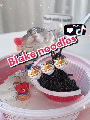 A post by @puffsisterbuff on TikTok caption: Black noodles🍜#puffsister #puff12milline #thatlittlepuff #catoftiktok