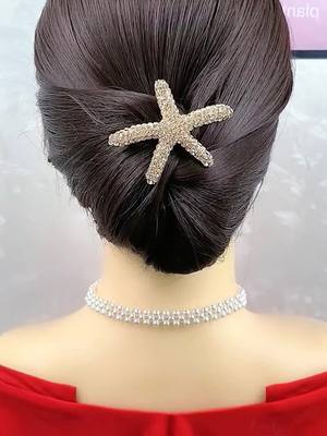 A post by @marryhuang520 on TikTok caption: Is this hairstyle tutorial simple? Follow me .teach you a simpler and beautiful hairstyle#girl #StyleSnap #beauty #women #foryou #hairstyles #fashion