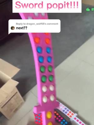 A post by @fidget_toys_shop001 on TikTok caption: Reply to @dragon_wolf55 sword popit. link in my bio.😀😀😀 #fidgettoy #fidgettoys #popit #popits #toy #fypシ