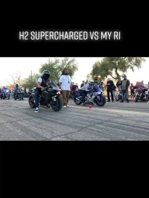 A post by @motorcycledudee on TikTok caption: Who won blue R1 vs H2 supercharged?? #racing #yamaha #kawasaki #supercharged