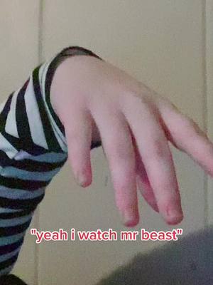 A post by @kammyinnit on TikTok caption: my hands are small </3. #christhememegod #mrbeast @mrbeast @chris_thememegod #christyson