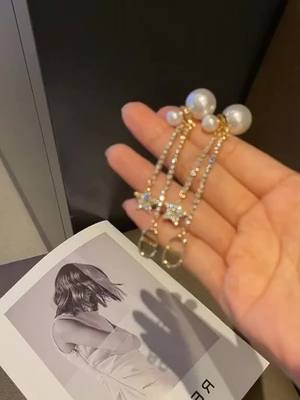 A post by @naiostudio on TikTok caption: #earring #gift #fyp #foryou