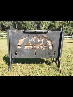 A post by @lismitchl on TikTok caption: Custom Fire Pit by Arrowhead Contracting! #mountedshooting #supportsmallbusiness #alberta #berta #plasmacutting #arrowheadcontracting