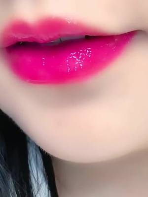 A post by @lipstickexpertt on TikTok caption: Her mouth was a slash of red lipstick.#lipstick #makeup #foryou #fyp