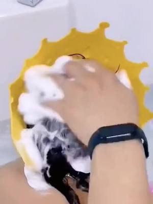 A post by @zhui230 on TikTok caption: With this shampoo cap, the child will never cry after washing his hair, ha ha#foryou #foryoupage #tiktok #