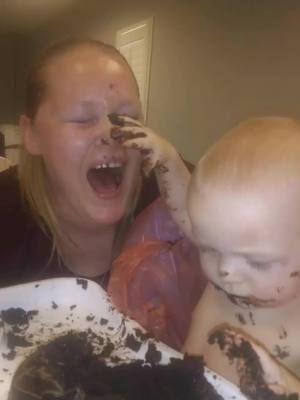 A post by @lisascott5141 on TikTok caption: Lukas 1st birthday feeding him mom cake