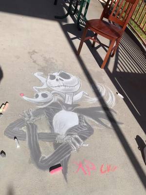 A post by @audreyplata on TikTok caption: Happy Halloween 🎃💀 #tiktokhallowen #halloween #halloweendecor #jacktheskeleton #fy #fyp #chalkart #chalk #foryou #foryoupage