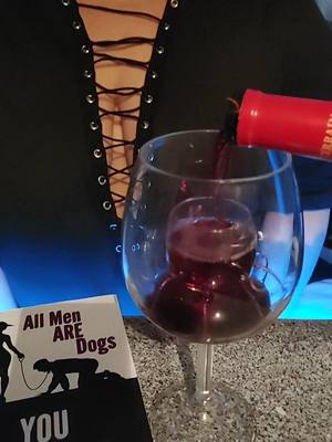 A post by @authorrickfort on TikTok caption: #reading and #wine