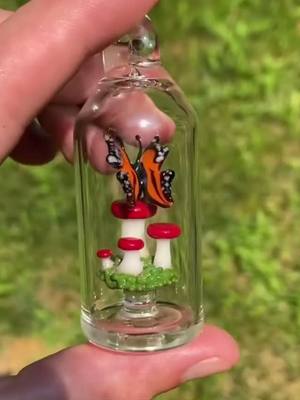 A post by @headyhorizon on TikTok caption: Tiny Butterfly World🦋 (artist-glasskid) #fypシ #viral #heady #headyglass #glassart