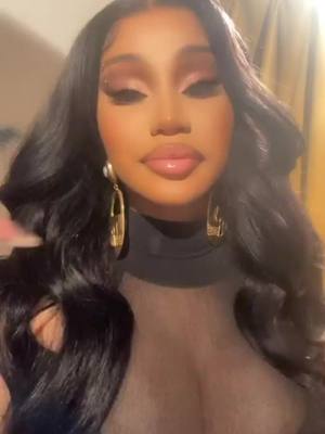 A post by @iam_cardix on TikTok caption: she looks amazing #PradaBucketChallenge #omgitscardi #trending #queenofrap #cardib #fyp #foryou