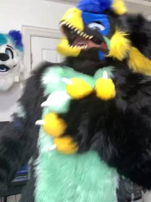 A post by @blackcheetah905 on TikTok caption: Digi cant help but laugh at your short comings, he dosent really know better.🤦🏾‍♀️ #furry #fursuit #lionking #dinomask #raptor #fyp #foryoupage