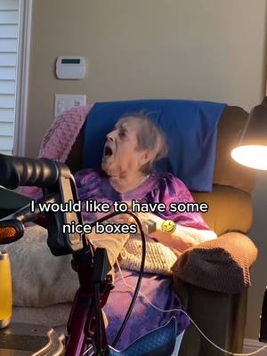 A post by @yiayiathegreat on TikTok caption: SHE’S HIGH MAINTENANCE WITH BOXES 🤣#yiayiathegreat #grandma #yiayia #goddamngrandma #angrygrandma #grandmagonewild #funnygrandma #grandson