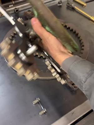 A post by @metalmaker on TikTok caption: Aseembly. #assembly #gears #gizmo #metalfabrication #welding #engineer #metalmaker #makingeveryday #made #weldinglife #weldernation #steampunk #fab