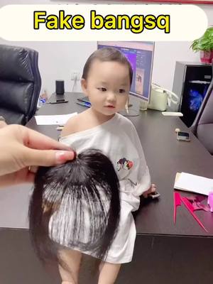 A post by @glitzywig on TikTok caption: #wig #hair #Fakebangs 🥰This little girl is my niece